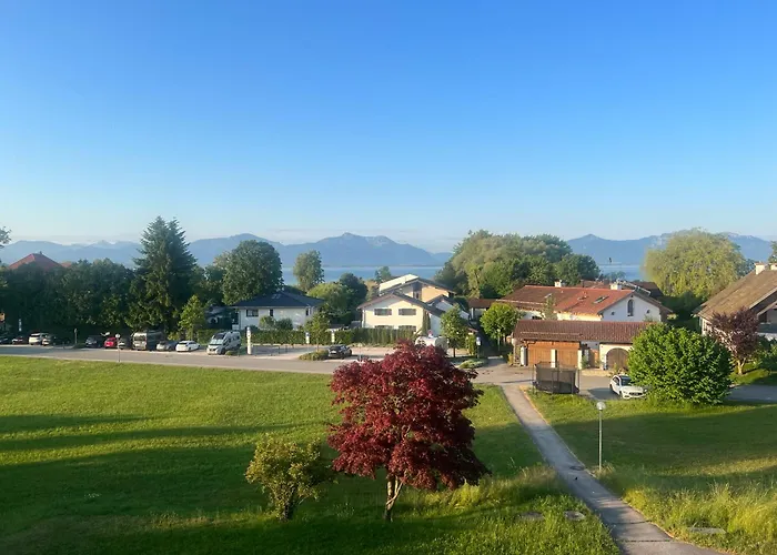 Designer-oberstueberl Mit Seeblick Auf Den Chiemsee & Alpenpanorama アパート ゼーオン・ゼーブルック